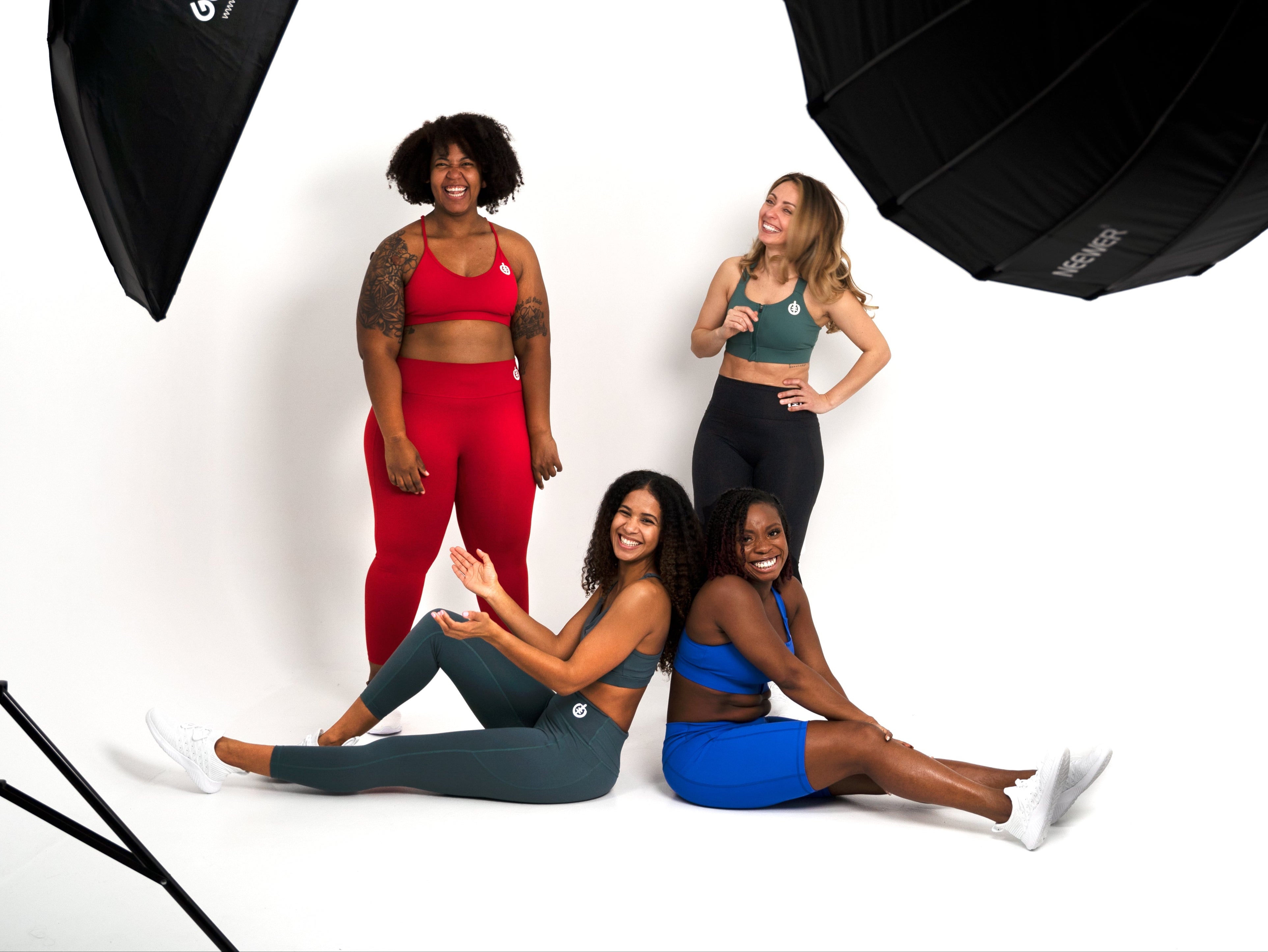 Four diverse women in ICONI's Back to Basics sports bras and leggings