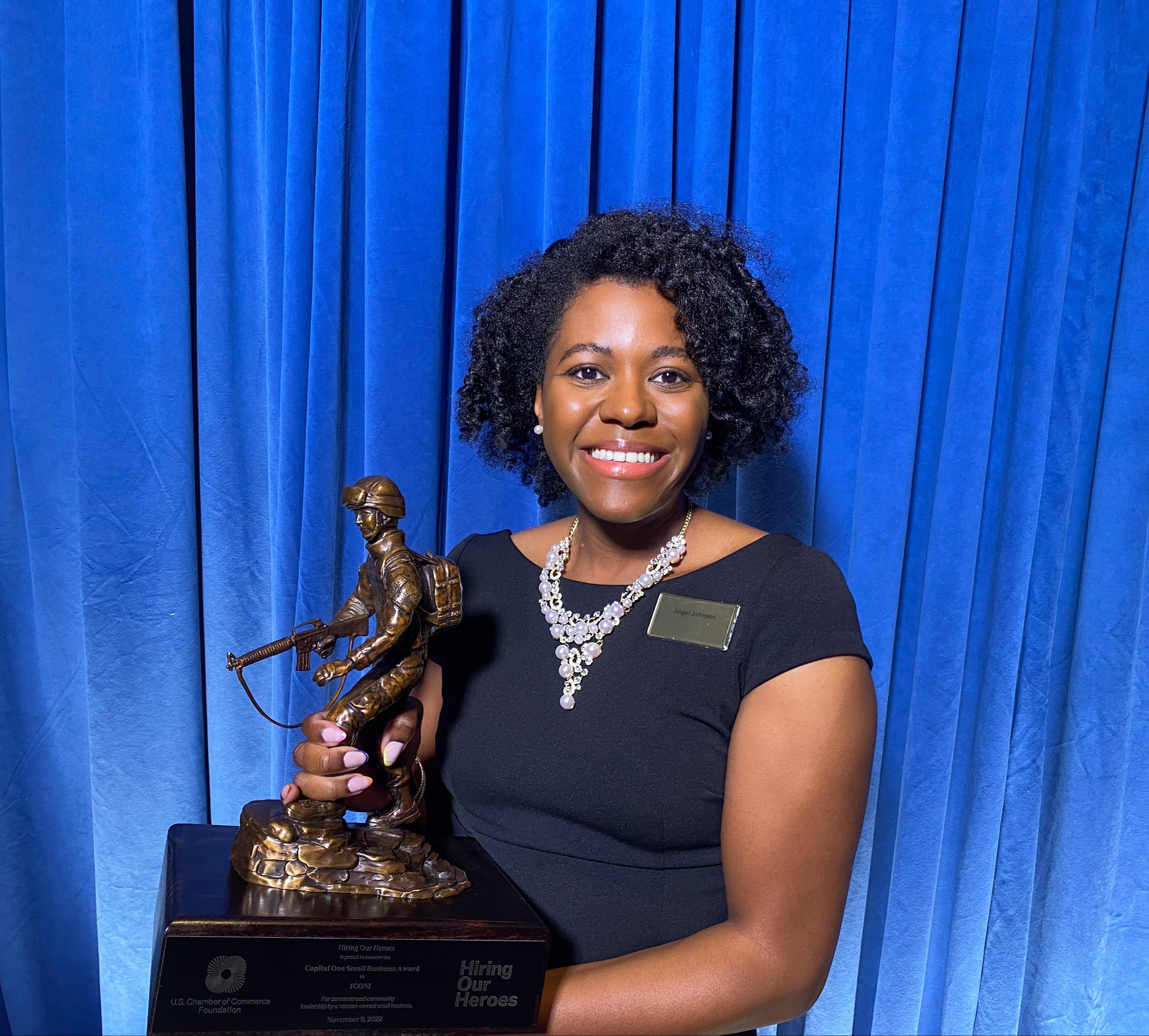 Woman holding trophy